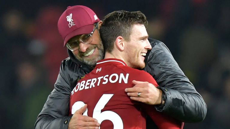 Liverpool&#39;s German manager Jurgen Klopp celebrates with Liverpool&#39;s Scottish defender Andrew Robertson on the pitch after the English Premier League football match between Watford and Liverpool at Vicarage Road Stadium in Watford, north of London on November 24, 2018.