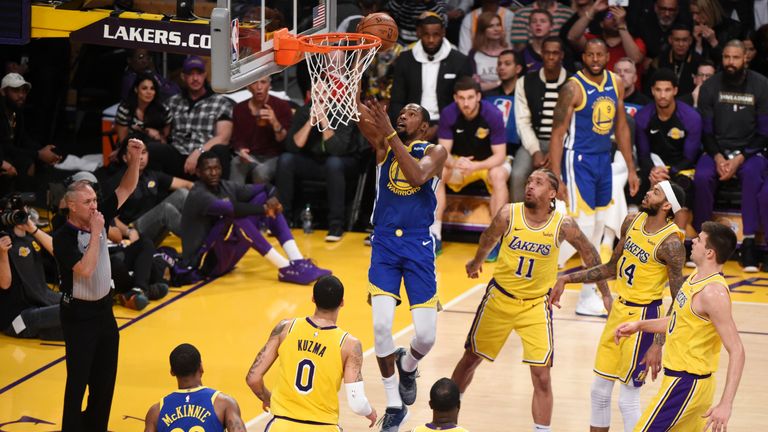 Kevin Durant of the Golden State Warriors shoots the ball against the Los Angeles Lakers