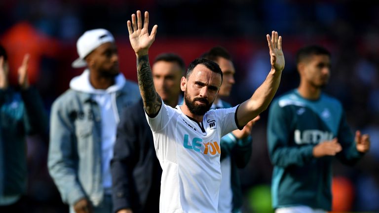 Leon Britton of Swansea City shows appreciation to the fans after the Premier League match between Swansea City and Stoke City at Liberty Stadium on May 13, 2018 in Swansea, Wales.