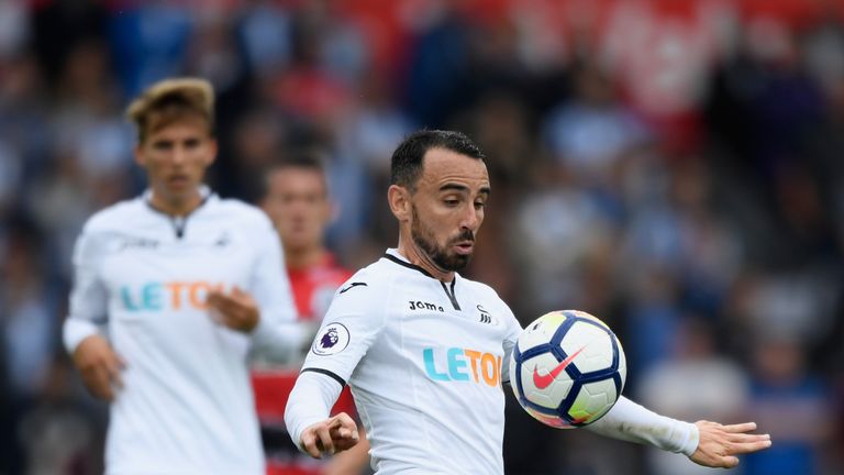 Swansea player Leon Britton in action during the Premier League match between Swansea City and Huddersfield Town at Liberty Stadium on October 14, 2017 in Swansea, Wales.