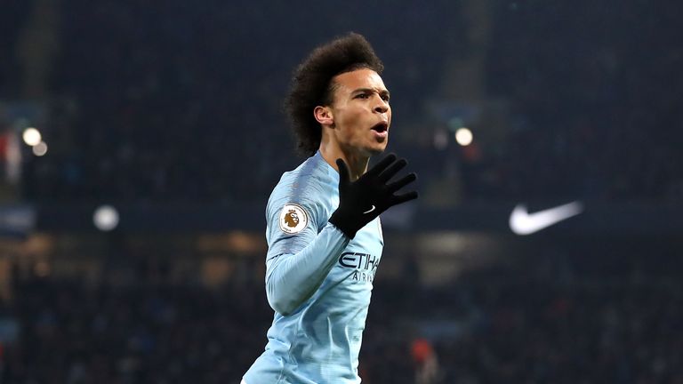 Leroy Sane celebrates after his goal puts Manchester City ahead for a second time in the match