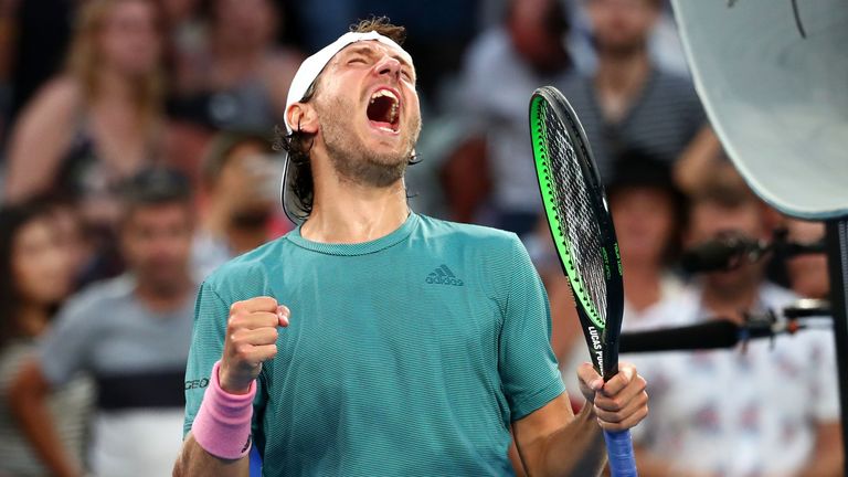 Lucas Pouille of France celebrates after winning match point in his fourth round match against Borna Coric of Croatia during day eight of the 2019 Australian Open at Melbourne Park on January 21, 2019 in Melbourne, Australia. 