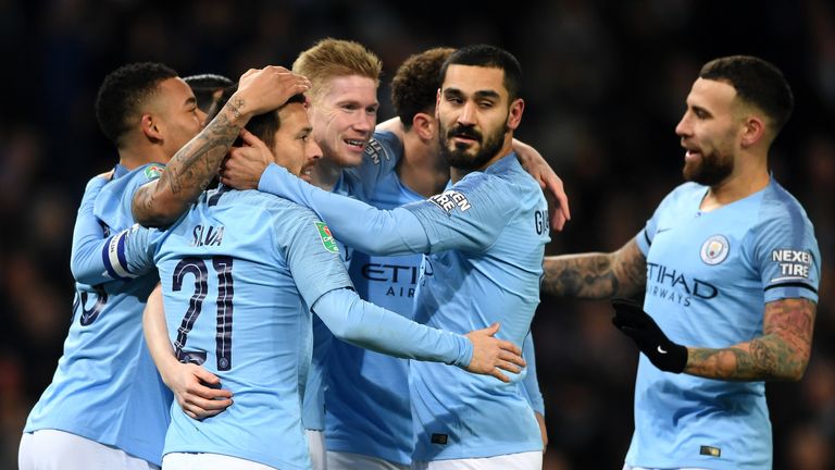 Manchester City celebrate during the Carabao Cup Semi Final First Leg match against Burton Albion at Etihad Stadium on January 9, 2019 in Manchester, United Kingdom