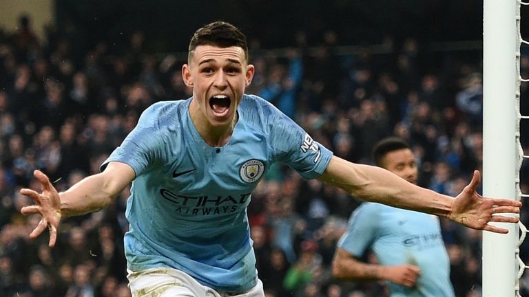Manchester City's English midfielder Phil Foden celebrates after scoring their second goal during the English FA Cup third round football match between Manchester City and Rotherham United at the Etihad Stadium in Manchester, north west England, on January 6, 2019. 