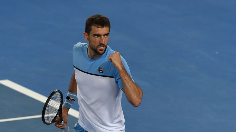 Croatia's Marin Cilic celebrates after winning the fourth set against Spain's Fernando Verdasco during their men's singles match on day five of the Australian Open tennis tournament in Melbourne early January 19, 2019. 