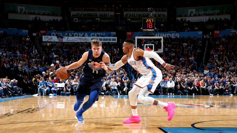 OKLAHOMA CITY, OK - DECEMBER 31: Luka Doncic #77 of the Dallas Mavericks handles the ball against the Oklahoma City Thunder on December 31, 2018 at Chesapeake Energy Arena in Oklahoma City, Oklahoma. NOTE TO USER: User expressly acknowledges and agrees that, by downloading and or using this photograph, User is consenting to the terms and conditions of the Getty Images License Agreement. Mandatory Copyright Notice: Copyright 2018 NBAE (Photo by Zach Beeker/NBAE via Getty Images)