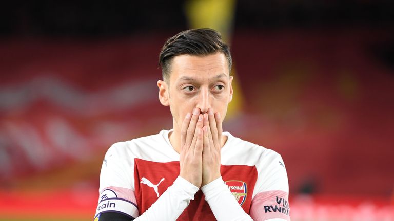 Mesut Ozil stands on the pitch following Arsenal&#39;s 1-1 draw with Liverpool in Novermber 2018.