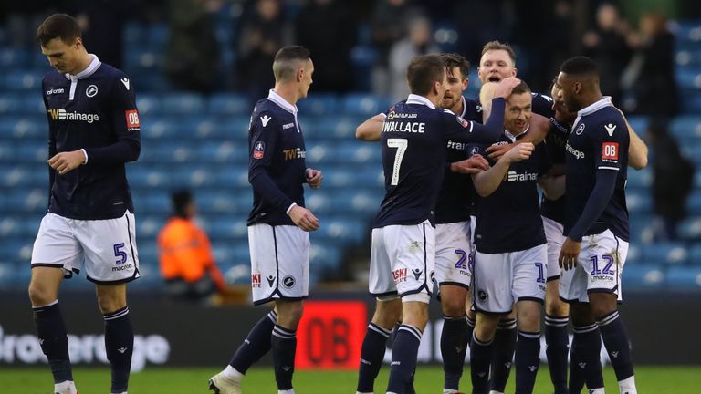 Millwall players celebrate their teams first goal during the FA Cup Third Round match between Millwall and Hull City at The Den on January 5, 2019 in London, United Kingdom.
