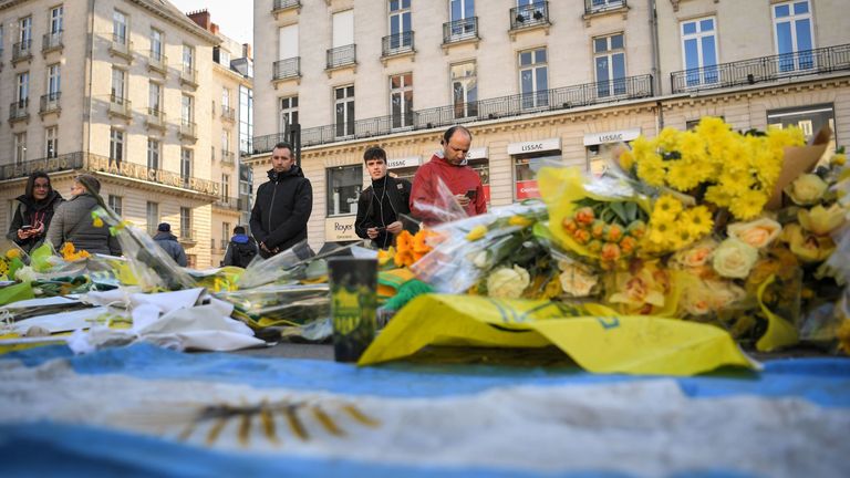 Members of the public pay their respects to missing footballer Emiliano Sala in Nantes, western France