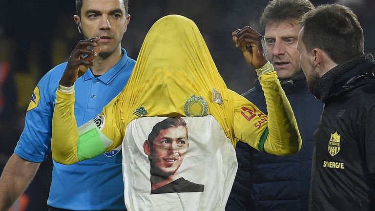 Abdul Majeed Waris lifts his shirt to reveal an image of his former team-mate Emiliano Sala after scoring Nantes' goal in their 1-1 draw with Saint-Etienne