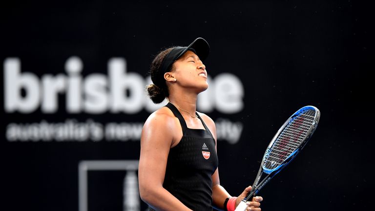 Japan's Naomi Osaka drops her racket while playing against Lesia Tsurenko of Ukraine during their women's semi-final match at the Brisbane International tennis tournament in Brisbane on January 5, 2019