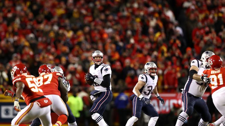 Tom Brady of the New England Patriots looks to pass in the first half against the Kansas City Chiefs during the AFC Championship Game