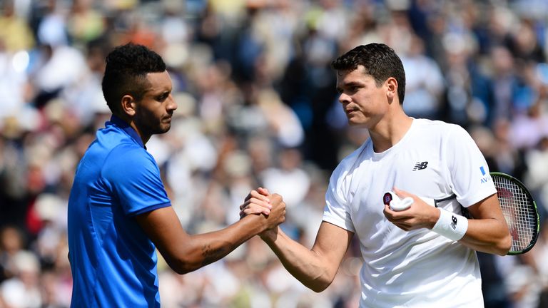 Nick Kyrgios of Australia shake hands with Milos Raonic of Canada after their match on day 3 at Queens Club on June 15, 2016 in London, England