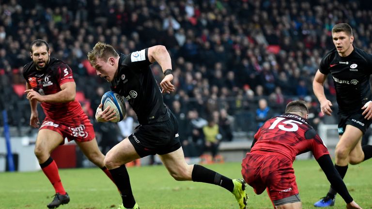 Saracens' center from England Nick Tompkins runs to score during the European Champions Cup rugby union pool match between Lyon and Saracens at the Matmut Stadium de Gerland in Lyon, central-eastern France, on January 13, 2019.