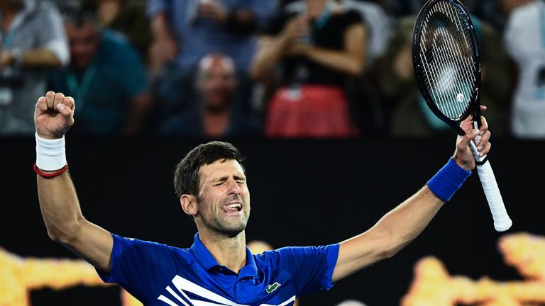 Novak Djokovic celebrates victory over Lucas Pouille in the Men&#39;s semi-final at the Australian Open