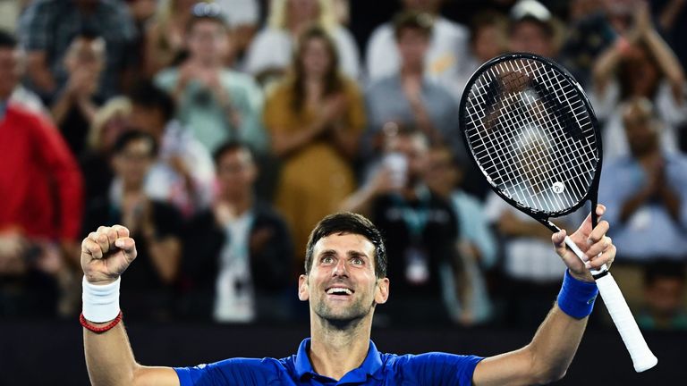 Novak Djokovic celebrates victory over Lucas Pouille in the Men's semi-final at the Australian Open