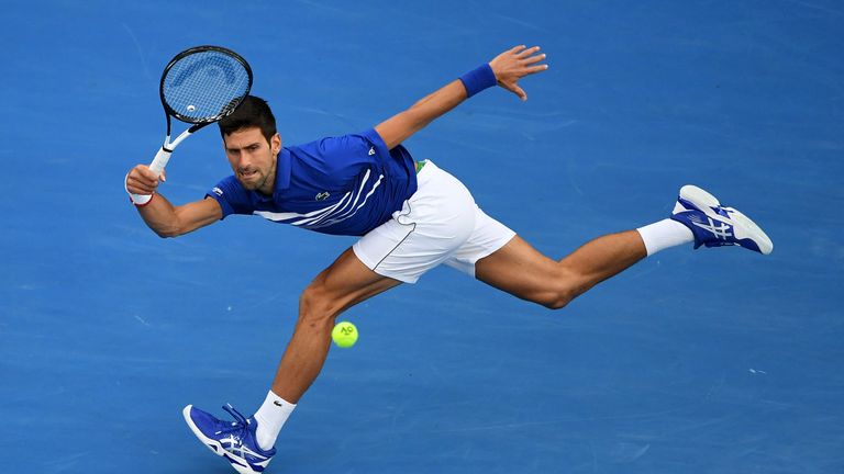 Novak Djokovic of Serbia plays a backhand in his Men's Singles Final match against Rafael Nadal of Spain during day 14 of the 2019 Australian Open at Melbourne Park on January 27, 2019 in Melbourne, Australia