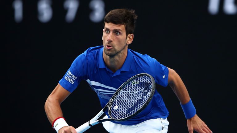 Novak Djokovic of Serbia runs to play a shot in his Men's Singles Final match against Rafael Nadal of Spain during day 14 of the 2019 Australian Open at Melbourne Park on January 27, 2019 in Melbourne, Australia. 