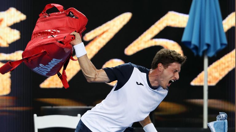 Pablo Carreno Busta of Spain throws his bag as he shows his frustration after defeat in his fourth round match against Kei Nishikori of Japan during day eight of the 2019 Australian Open at Melbourne Park on January 21, 2019 in Melbourne, Australia.