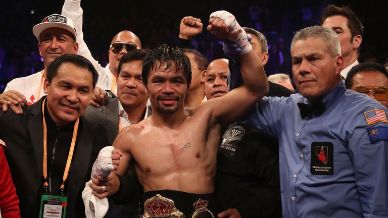 Manny Pacquiao celebrates his win over Adrien Broner