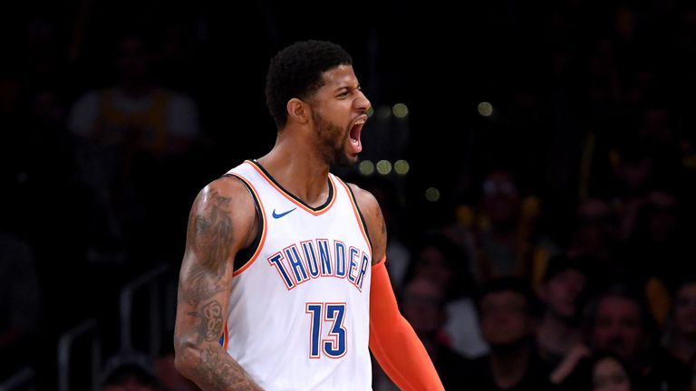 Paul George celebrates his alley-oop dunk during a 107-100 win over the Los Angeles Lakers