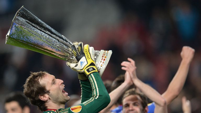 Petr Cech celebrates with the Europa League trophy after Chelsea defeat Benfica in 2013 final