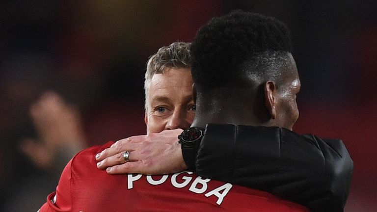 Ole Gunnar Solskjaer, Interim Manager of Manchester United celebrates victory with Paul Pogba after the Premier League match between Manchester United and AFC Bournemouth at Old Trafford on December 30, 2018 in Manchester, United Kingdom. 