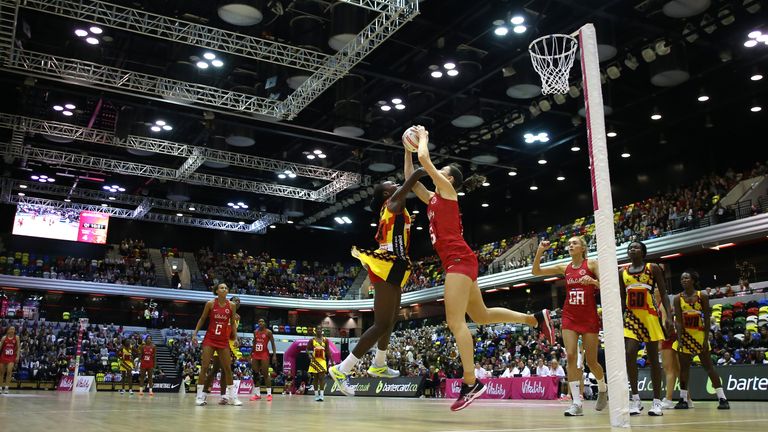 England Roses Rachel Dunn in action against the Uganda She Cranes