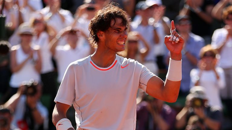 Rafael Nadal of Spain celebrates match point in the men's singles semi-final match against Novak Djokovic of Serbia on day thirteen of the French Open at Roland Garros on June 7, 2013 in Paris, France.