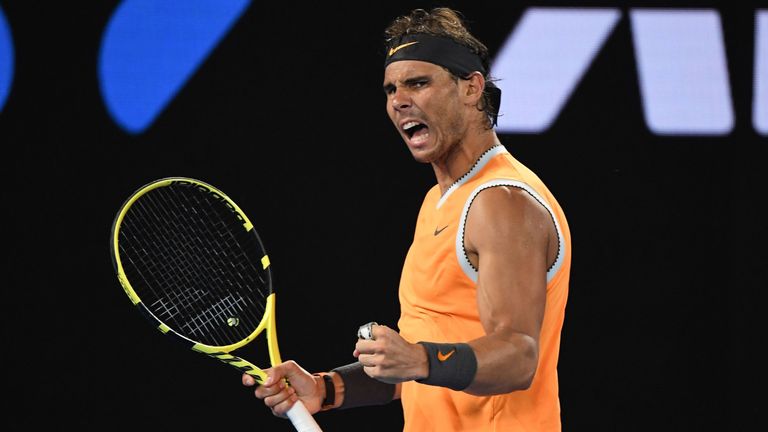 Spain's Rafael Nadal reacts after a point against Australia's Alex de Minaur during their men's singles match on day five of the Australian Open tennis tournament in Melbourne on January 18, 2019