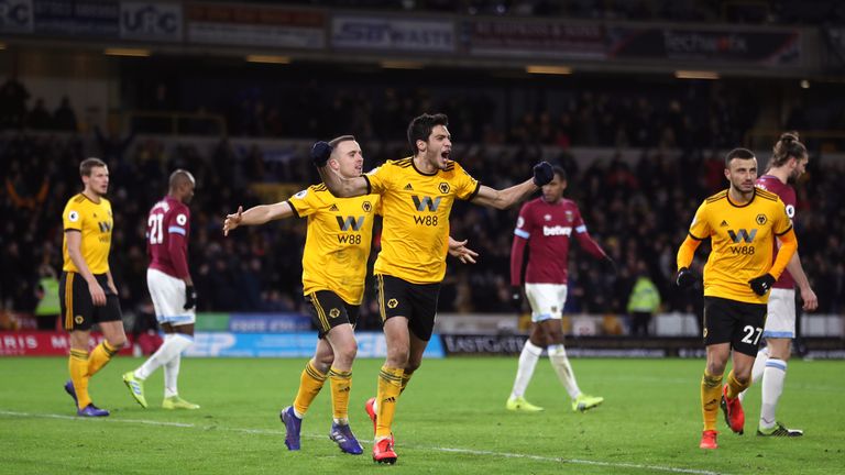 Raul Jimenez celebrates his double against West Ham