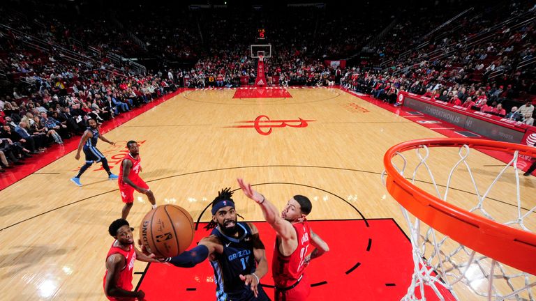 HOUSTON, TX - DECEMBER 31: Mike Conley #11 of the Memphis Grizzlies shoots the ball during the game against the Houston Rockets on December 31, 2018 at the Toyota Center in Houston, Texas. NOTE TO USER: User expressly acknowledges and agrees that, by downloading and or using this photograph, User is consenting to the terms and conditions of the Getty Images License Agreement. Mandatory Copyright Notice: Copyright 2018 NBAE (Photo by Bill Baptist/NBAE via Getty Images)