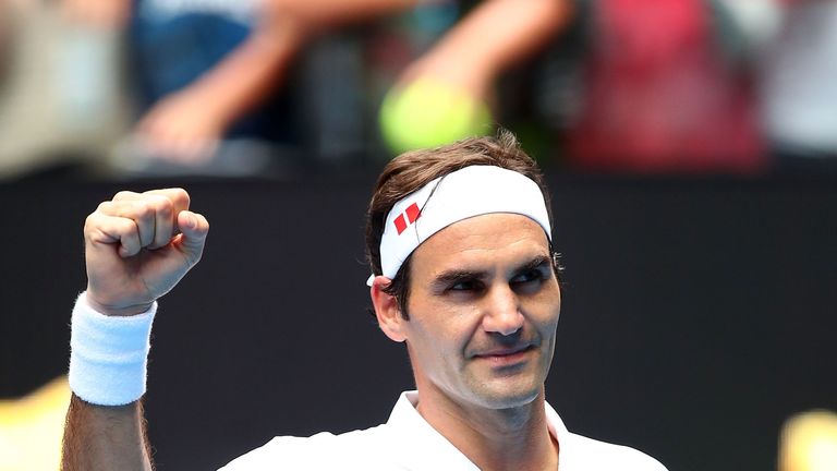 Roger Federer of Switzerland celebrates winning his second round match against Daniel Evans of Great Britain during day three of the 2019 Australian Open at Melbourne Park on January 16, 2019 in Melbourne, Australia