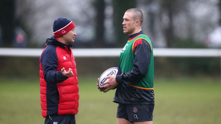 Eddie Jones and Mike Brown during an England training session in 2016