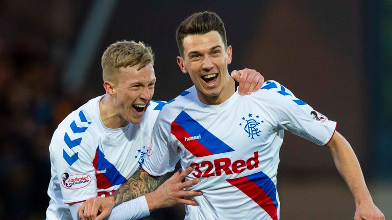 Ryan Jack celebrates with Ross McCrorie (left) after he gives Rangers the lead at Livingston