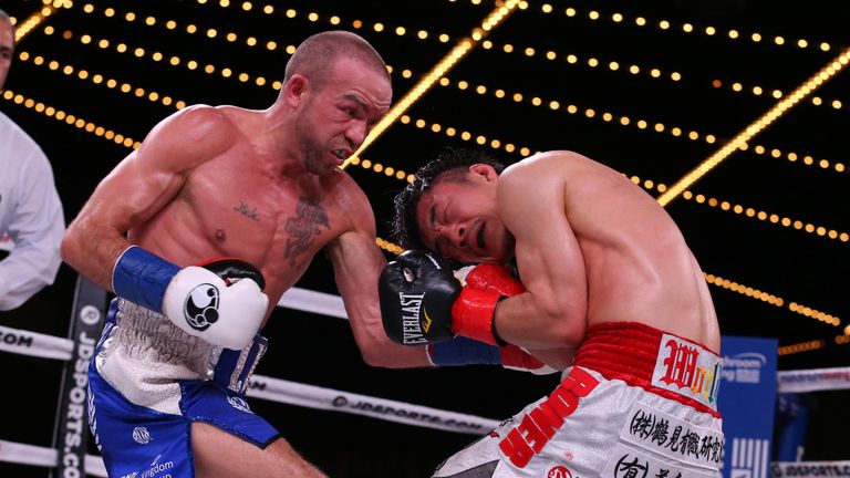 BF super bantamweight champion TJ Doheny and Ryohei Takahashi during their fight at the Hulu Theater at Madison Square Garden.  Mandatory Credit: Ed Mulholland/Matchroom Boxing USA