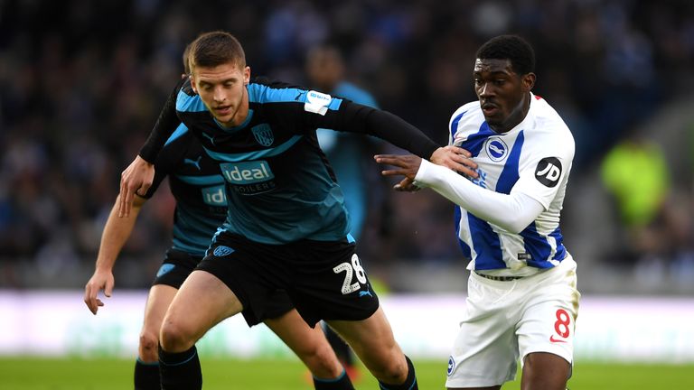 Sam Field of West Bromwich Albion is challenged by Yves Bissouma of Brighton and Hove Albion during the FA Cup Fourth Round match between Brighton & Hove Albion and West Bromwich Albion at Emirates Stadium on January 26, 2019 in London, United Kingdom.