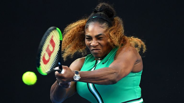 Serena Williams of the United States plays a backhand in her fourth round match against Simona Halep of Romania during day eight of the 2019 Australian Open at Melbourne Park on January 21, 2019 in Melbourne, Australia. 