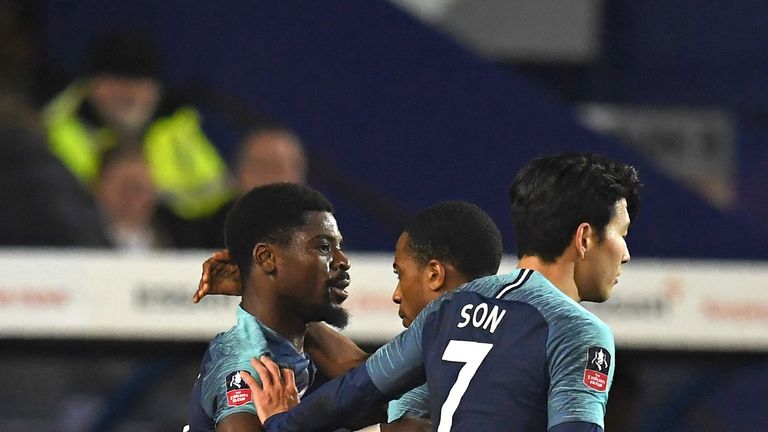 Serge Aurier celebrates with Tottenham team-mates after opening the scoring