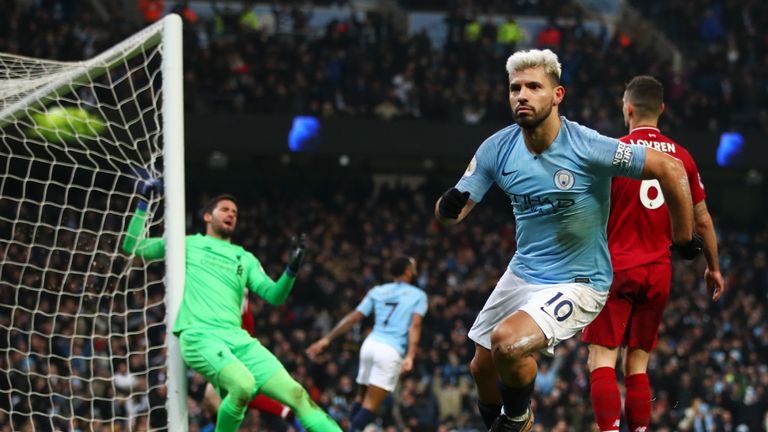 Sergio Aguero runs from goal in celebration after giving Manchester City the lead