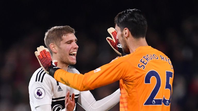 Maxime Le Marchand and Sergio Rico celebrate Fulham's recent win against Huddersfield