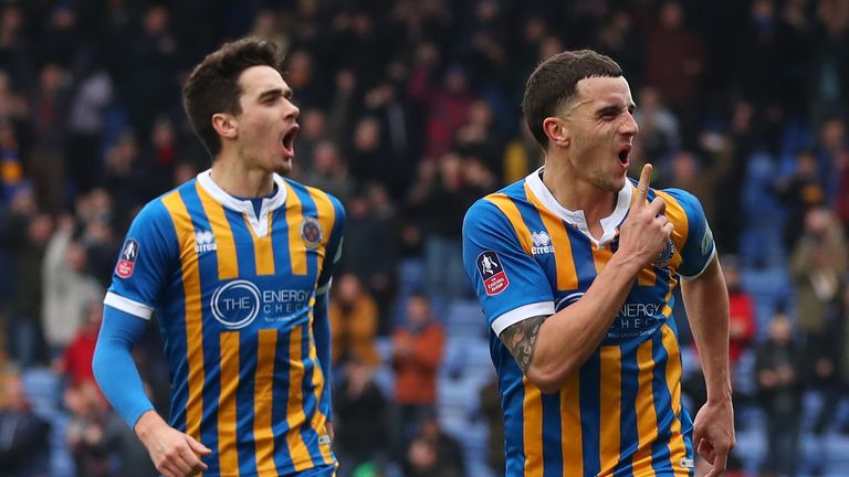 Oliver Norburn celebrates giving Shrewsbury the lead against Stoke