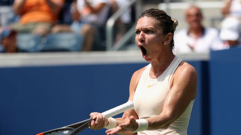 Simona Halep of Romania reacts in her women's singles first round match against Kaia Kanepi of Estonia on Day One of the 2018 US Open at the USTA Billie Jean King National Tennis Center on August 27, 2018 in the Flushing neighborhood of the Queens borough of New York City.