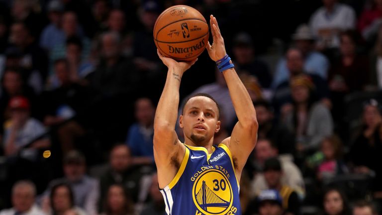  Stephen Curry of the Golden State Warriors puts up a shot against the Denver Nuggets in the first quarter at the Pepsi Center