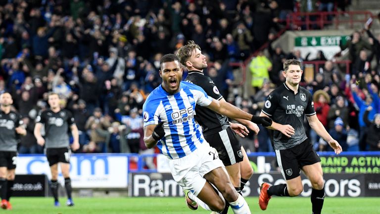 Steve Mounie celebrates after putting Huddersfield ahead