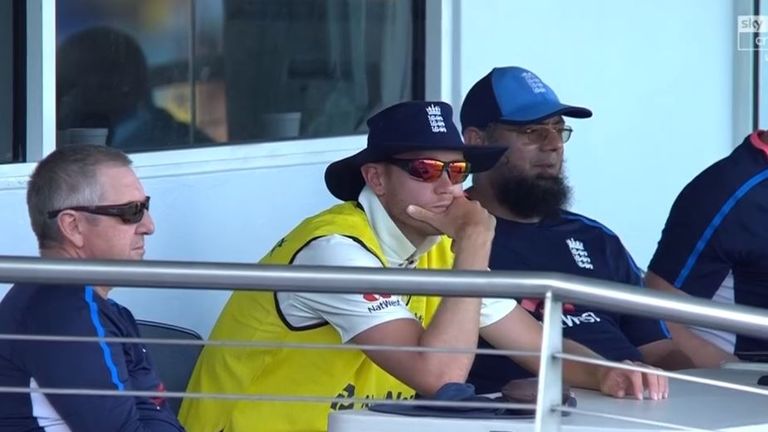 Stuart Broad looks on from the England balcony after not being selected for the first Test