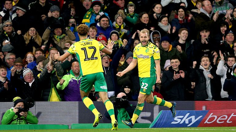 Norwich City's Teemu Pukki (right) celebrates scoring his side's first goal of the game