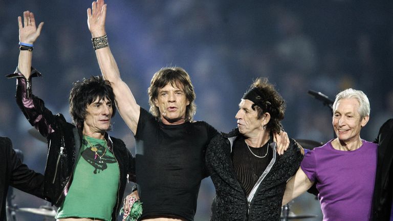 The Rolling Stones salute the Detroit crowd following their Super Bowl set list