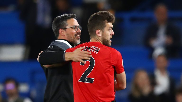 David Wagner, Manager of Huddersfield Town and Tommy Smith of Huddersfield Town celebarate avoiding relegation after the Premier League match between Chelsea and Huddersfield Town at Stamford Bridge on May 9, 2018 in London, England. 
