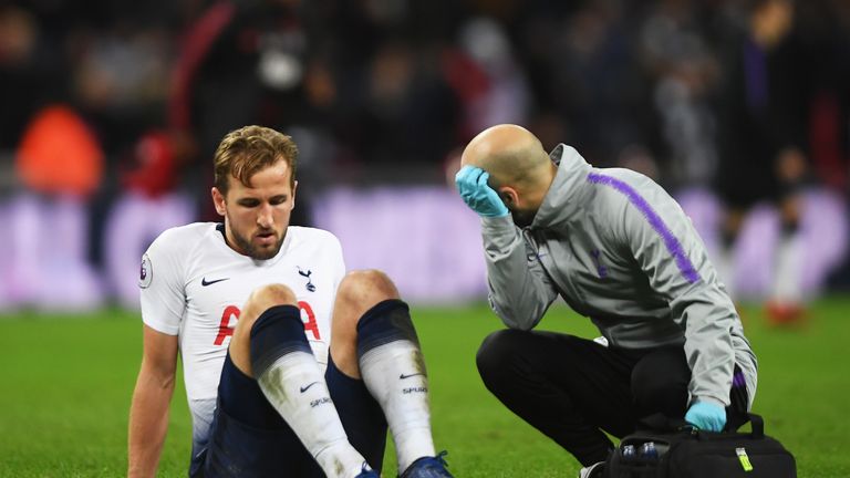 Tottenham striker Harry Kane goes down injured 